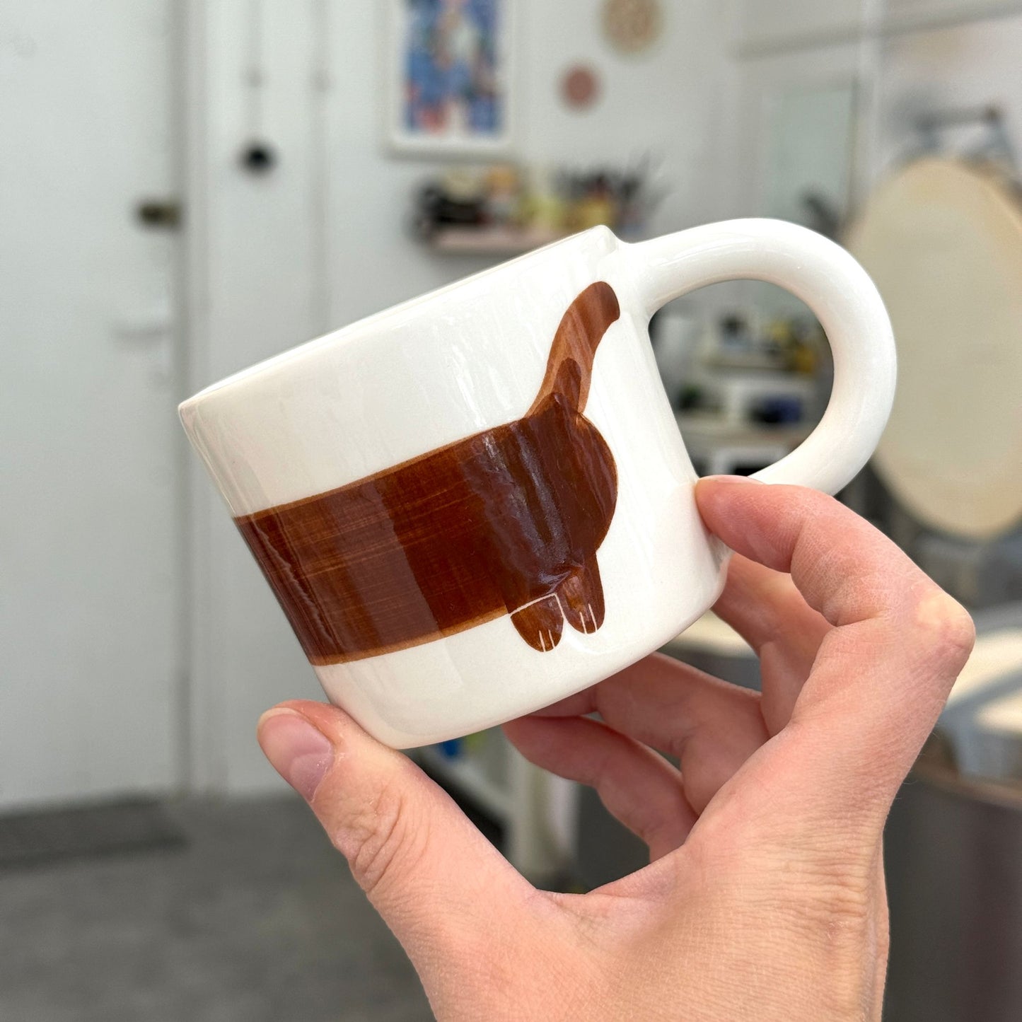 Kubek z rudym jamnikiem