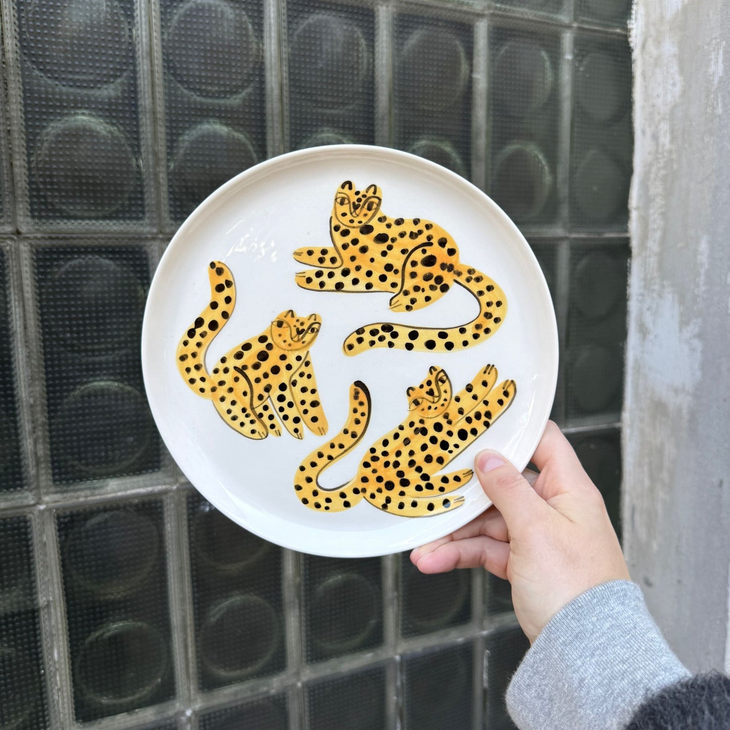 Talerz z kłębowiskiem lampartów 22 cm